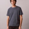T-Shirt mit durchgehendem Monogram und lockerer Passform T-Shirt mit durchgehendem Monogram und lockerer Passform