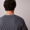 T-Shirt mit durchgehendem Monogram und lockerer Passform T-Shirt mit durchgehendem Monogram und lockerer Passform