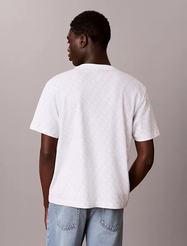 T-Shirt mit durchgehendem Monogram und lockerer Passform T-Shirt mit durchgehendem Monogram und lockerer Passform