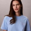 T-Shirt mit Schriftzug von Calvin Klein in Schreibschrift