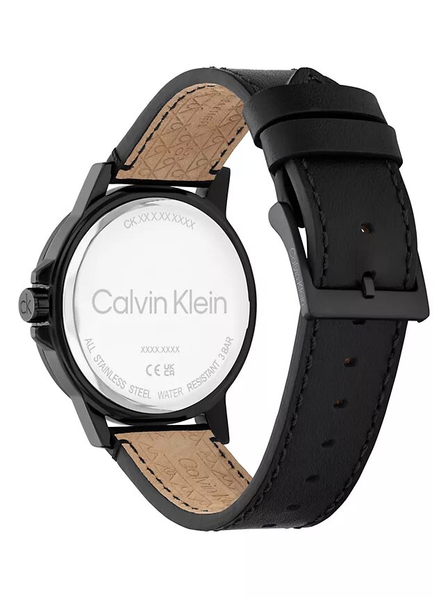 Uhr mit Emblem-Zifferblatt und Lederarmband Uhr mit Emblem-Zifferblatt und Lederarmband