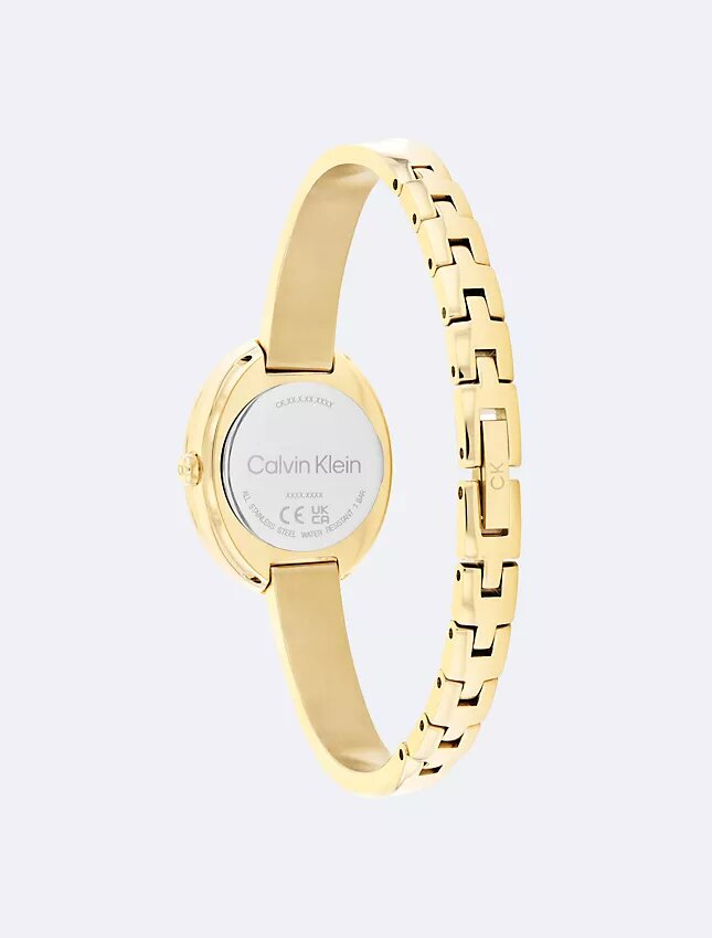 Uhr mit konturierter Lünette Uhr mit konturierter Lünette
