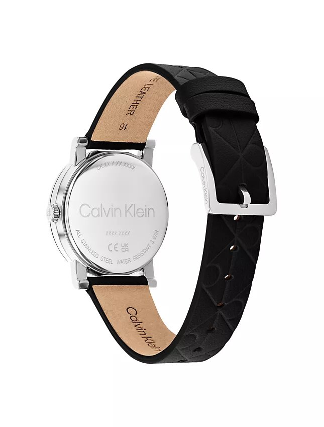 Uhr mit Lederarmband und durchgehendem Emblem-Zifferblatt Uhr mit Lederarmband und durchgehendem Emblem-Zifferblatt